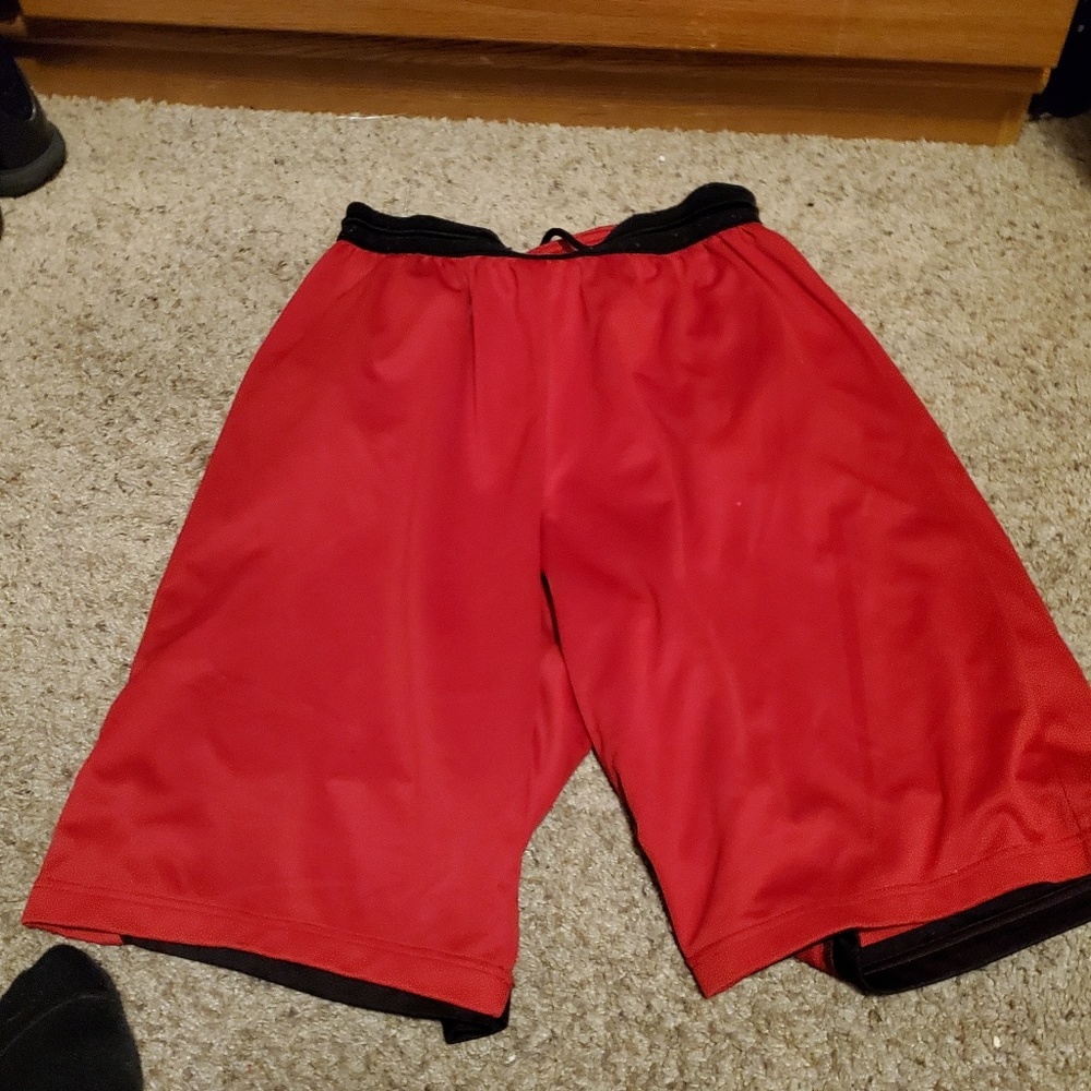 Red and black Adidas basketball shorts